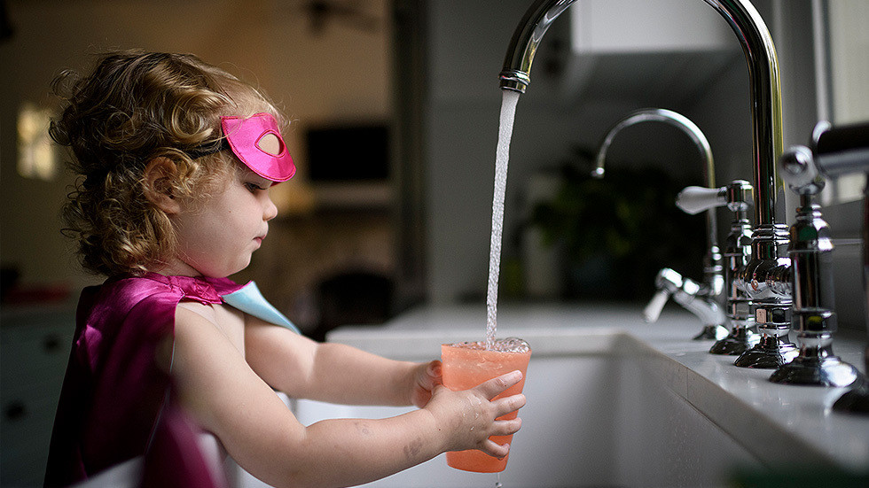 girl driking tap water